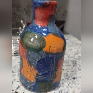 Artist signed "JS" Colorful Vase with carved face